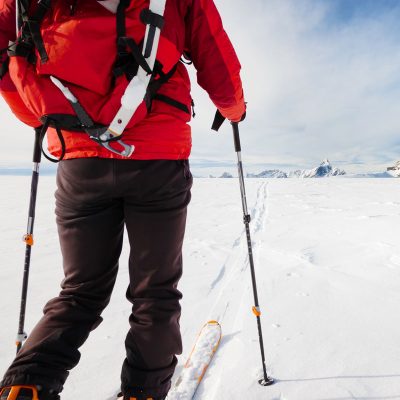 mountaineer-exploring-a-glacier-with-the-skis-PZWYW5Q.jpg